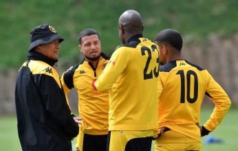Cavin Johnson of Kaizer Chiefs with his players