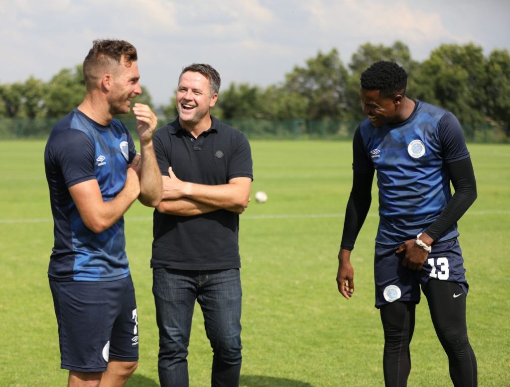 Michael Owen shares a joke with Gabuza and Grobler