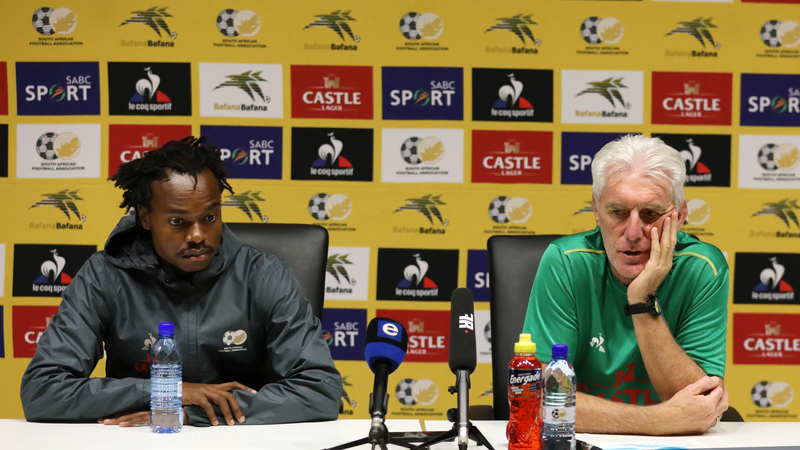 Percy Tau with Hugo Broos during a press conference 